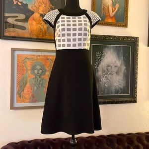Antonio Melani black and white dress with mesh and lace detail.